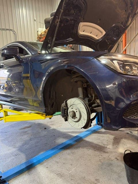 Mechanic working on a car